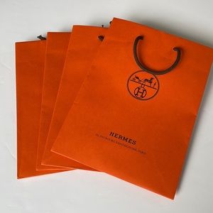 Hermes set of four shopping bags